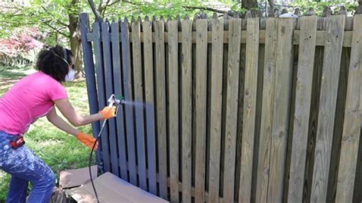 How do you paint an old fence